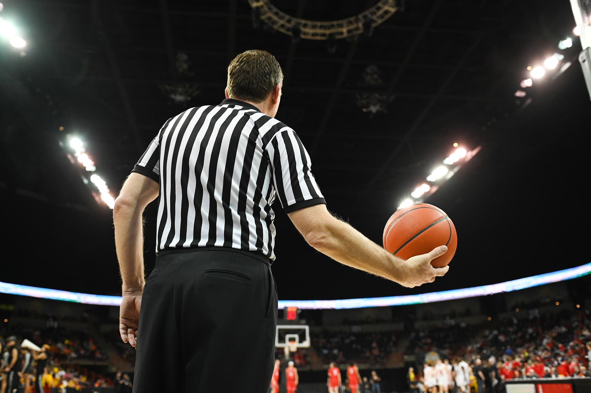 Referee holding a basketball