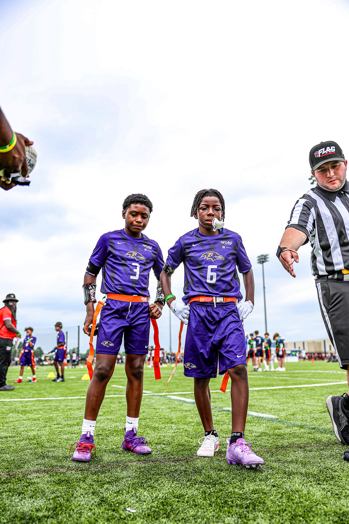 NFL FLAG official and players